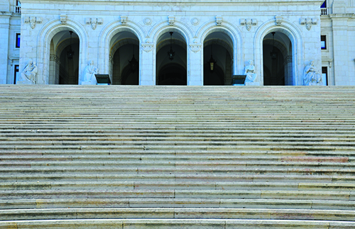 steep steps leading up to arched building