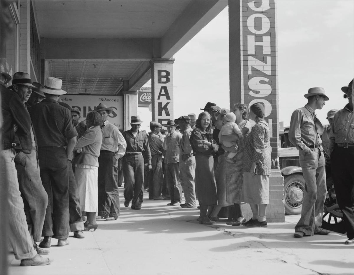 Workers waiting for relief checks during the Great Depression.